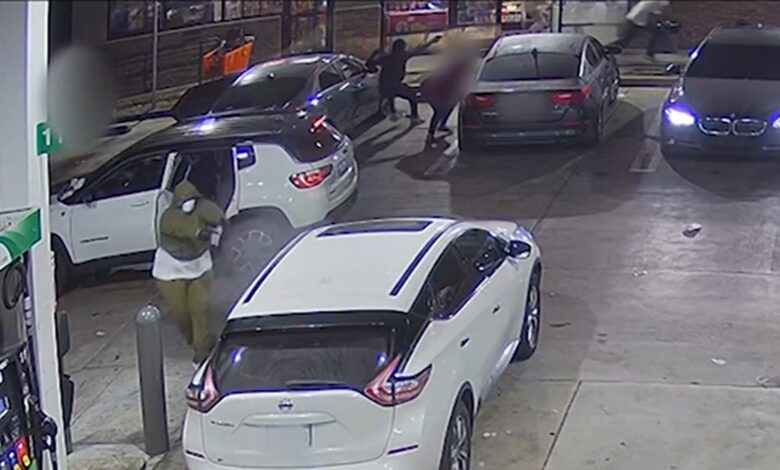 Gunmen attack car at gas station in horrific surveillance footage