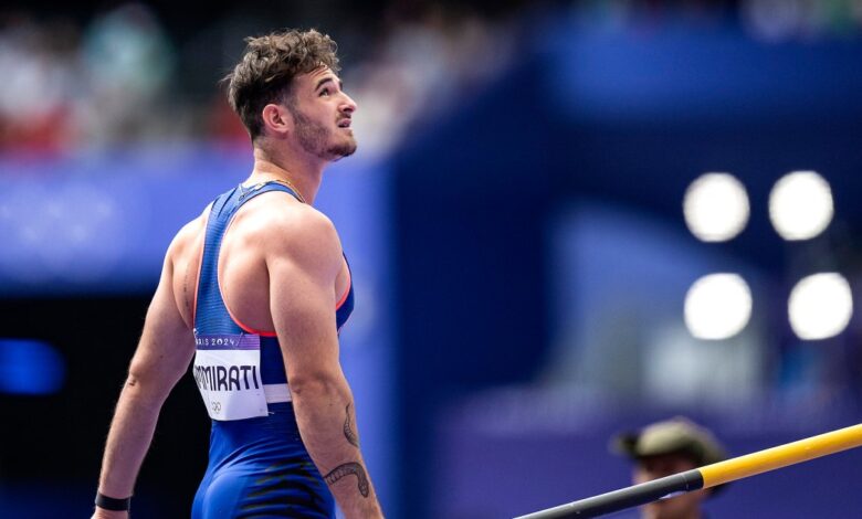 Pole vaulter Anthony Ammirati catches cross on the bar during the Olympic Games