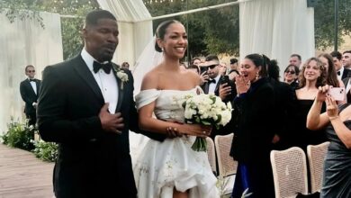 Jamie Foxx walks down the aisle with daughter Corinne during the wedding to Joe Hooten