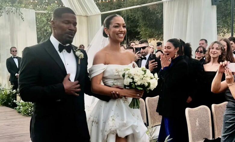 Jamie Foxx walks down the aisle with daughter Corinne during the wedding to Joe Hooten