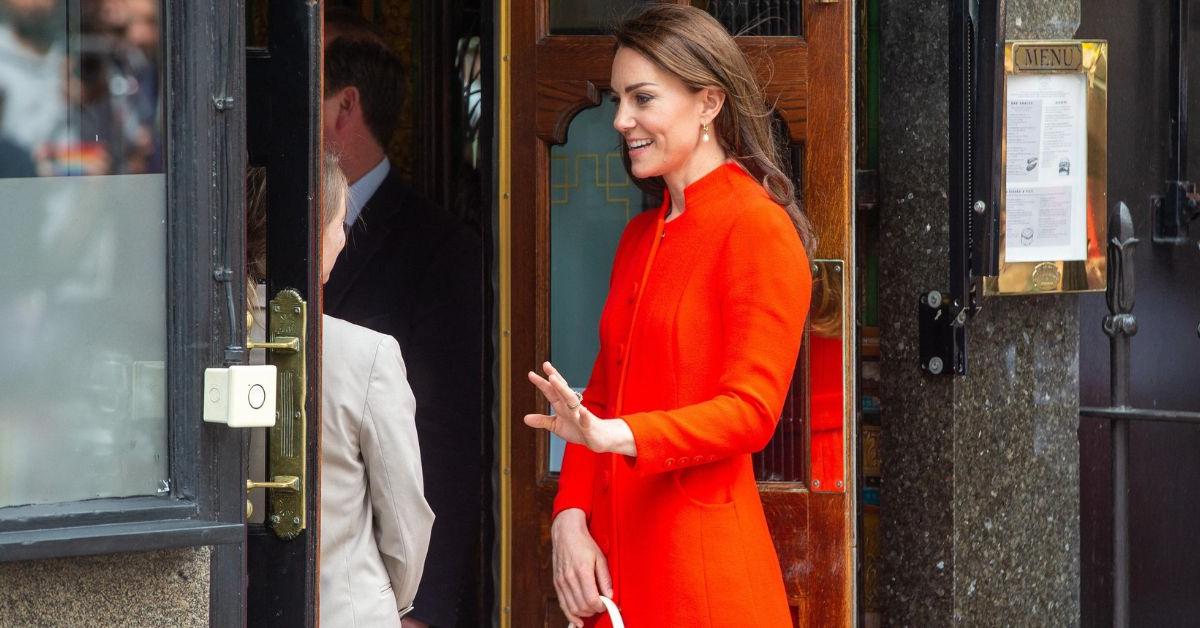 Kate Middleton pictured helping a cancer-stricken teen during a work outing