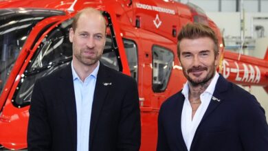 Prince William and David Beckham pose during royal charity visit