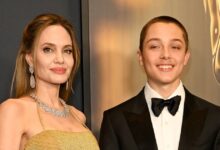 Angelina Jolie beams with pride next to son Knox during a rare public outing