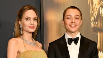 Angelina Jolie beams with pride next to son Knox during a rare public outing