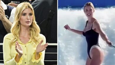 Ivanka shows off a hot figure in a plunging black swimsuit while surfing