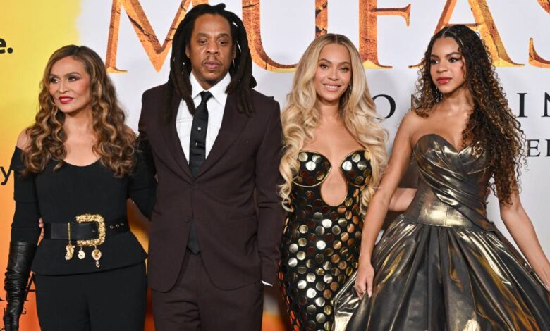 Jay-Z walks the red carpet with Beyonce and Blue Ivy amid rape allegations