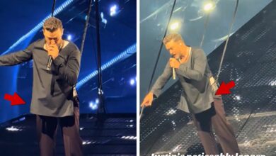 Justin Timberlake covers up in a longer shirt on stage after Bulge went viral