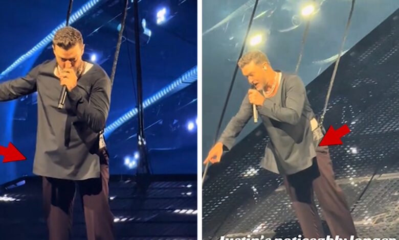 Justin Timberlake covers up in a longer shirt on stage after Bulge went viral