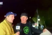 Dennis Quaid stops to talk to reporter and gives advice to evacuees as they flee home