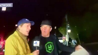 Dennis Quaid stops to talk to reporter and gives advice to evacuees as they flee home