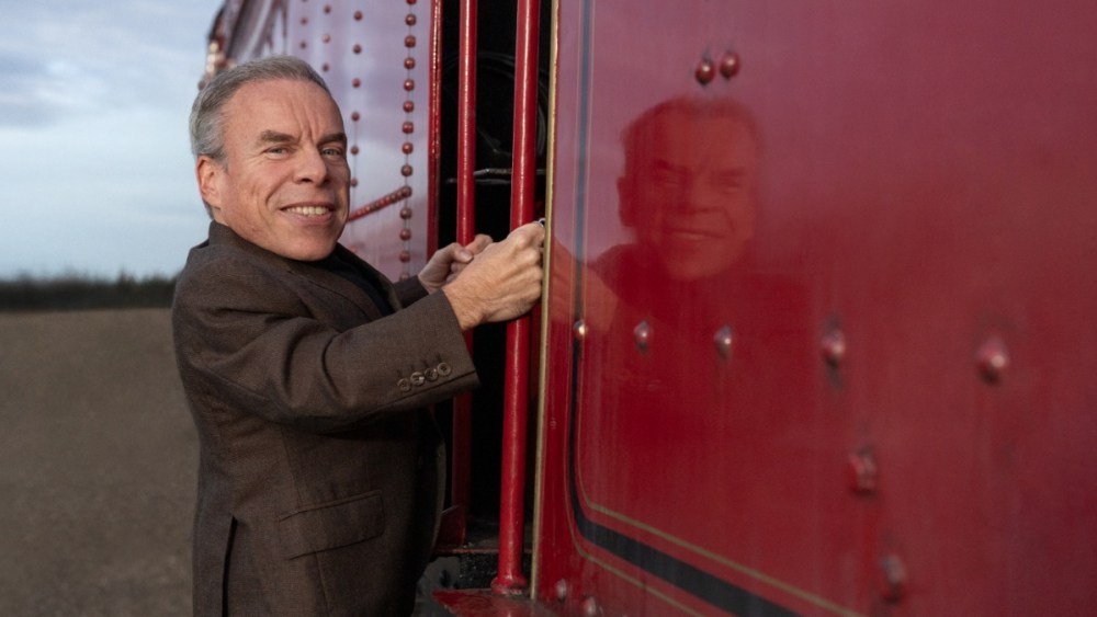 Warwick Davis returns as Professor Flitwick