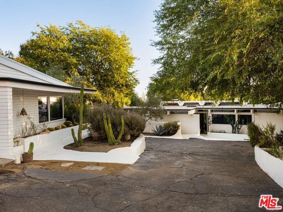 Built for artist David Green, this classic mid-century modern complex survived the devastating Eton Fire and is currently for sale for $2,449,000.