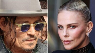 Johnny Depp split off by former co-star Charlize Theron on a red carpet