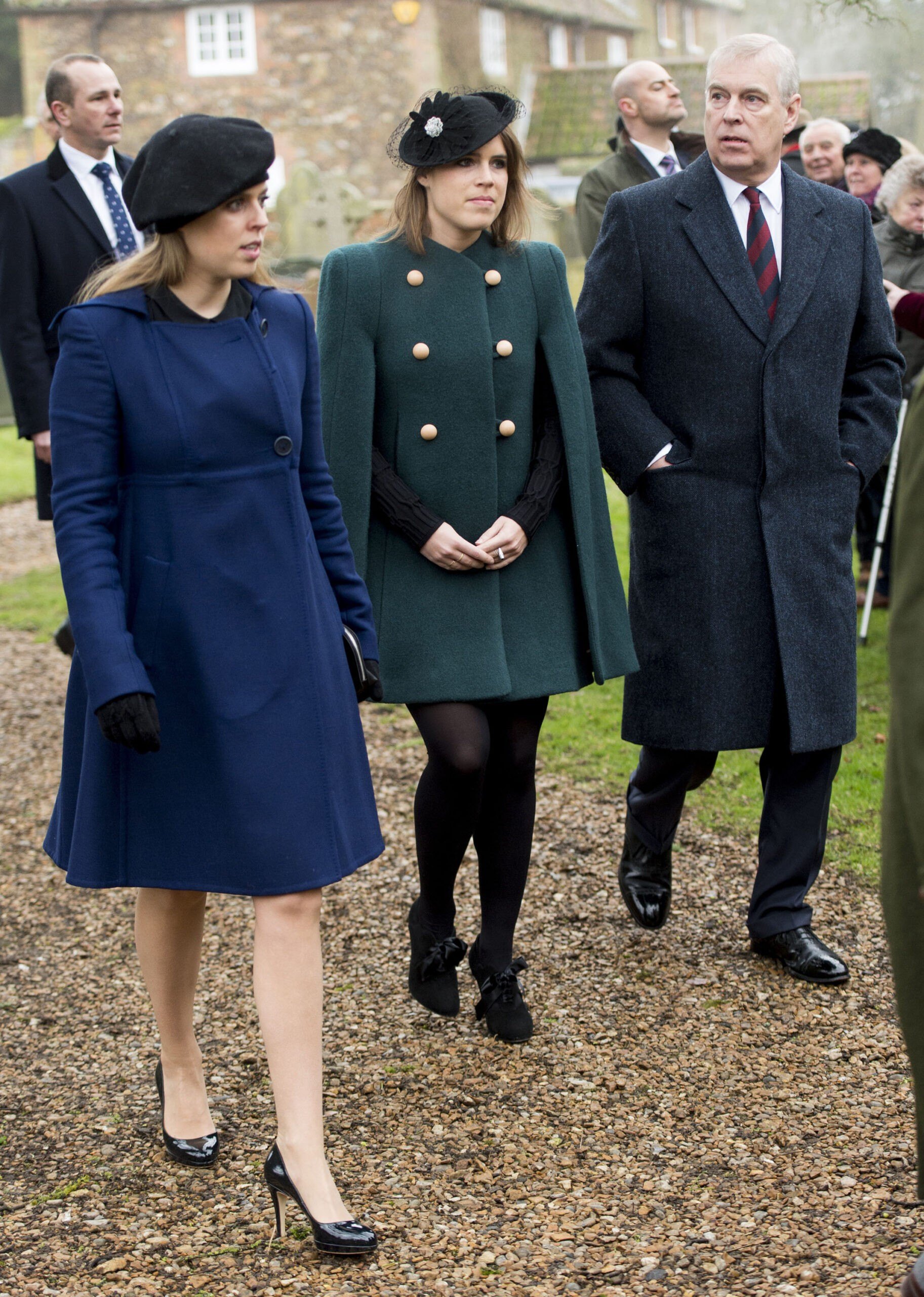Princess Eugenie and Princess Beatrice arrive at St Lawrence Church with Prince Andrew, Duke of York on January 21, 2018