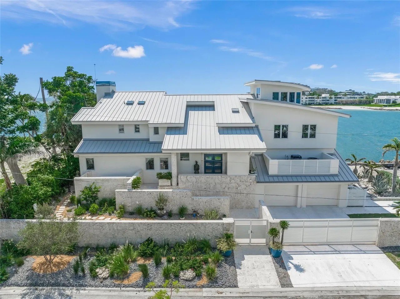 This private Lido Shores mansion in Sarasota, FL is for sale for $26 million.