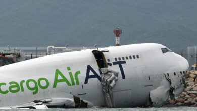 Two dead after cargo plane skids off runway at Hong Kong airport