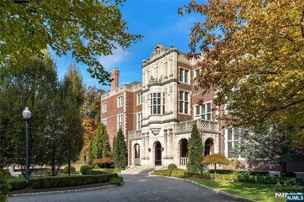 Bankrupt billionaire's lavish gilded mansion has seen a $14 million price cut after he was jailed for defrauding investors of $1.3 billion