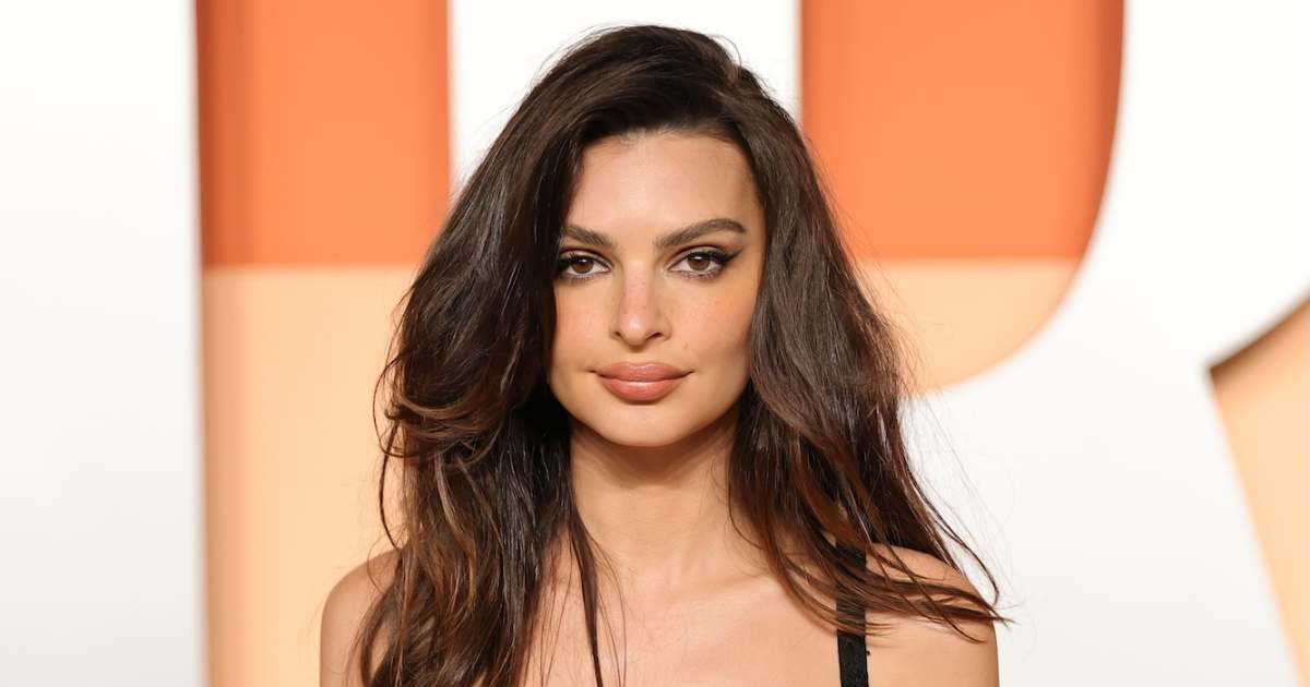 Emily Ratajkowski dances in a sheer skirt and shows off her thong in NYC