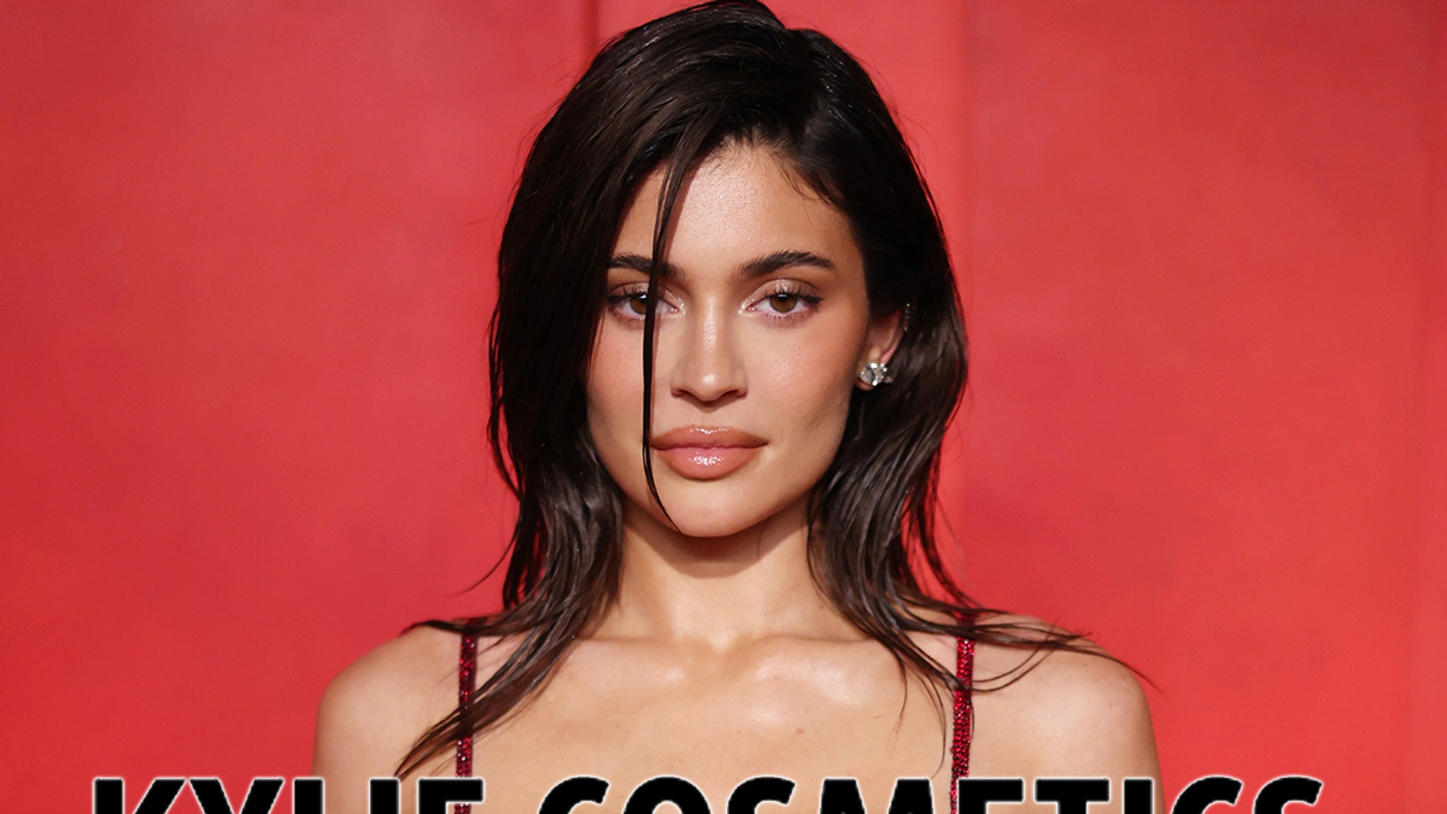 Kylie Jenner shows off cleavage in tight leather top as she promotes new perfume