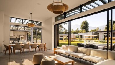 This beautiful pool pavilion illustrates how all spaces are extremely generous and feature floor-to-ceiling windows and glass doors leading to the ultimate indoor/outdoor experience.