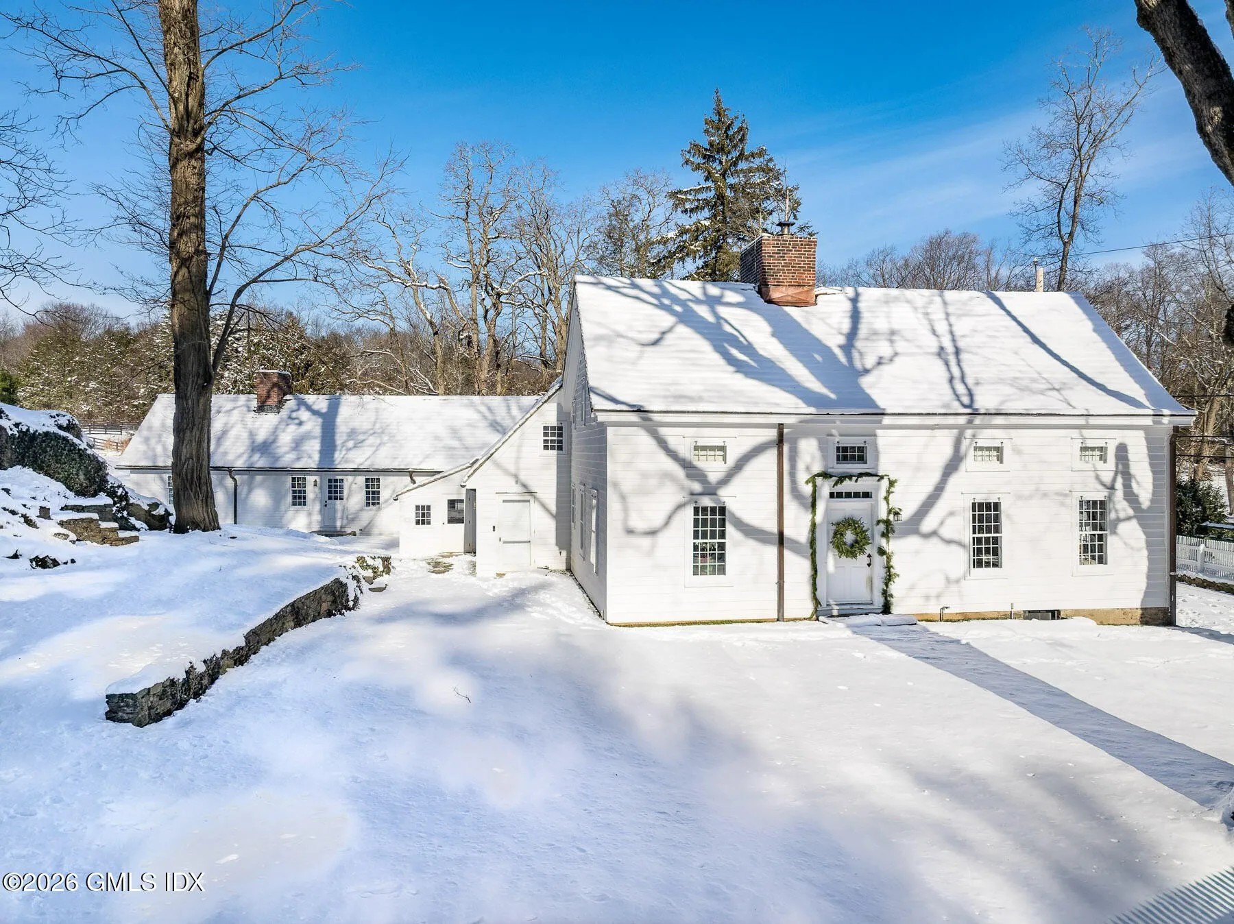 Exterior in the snow with a wreath from Chris Simms' equestrian estate in Greenwich, Connecticut
