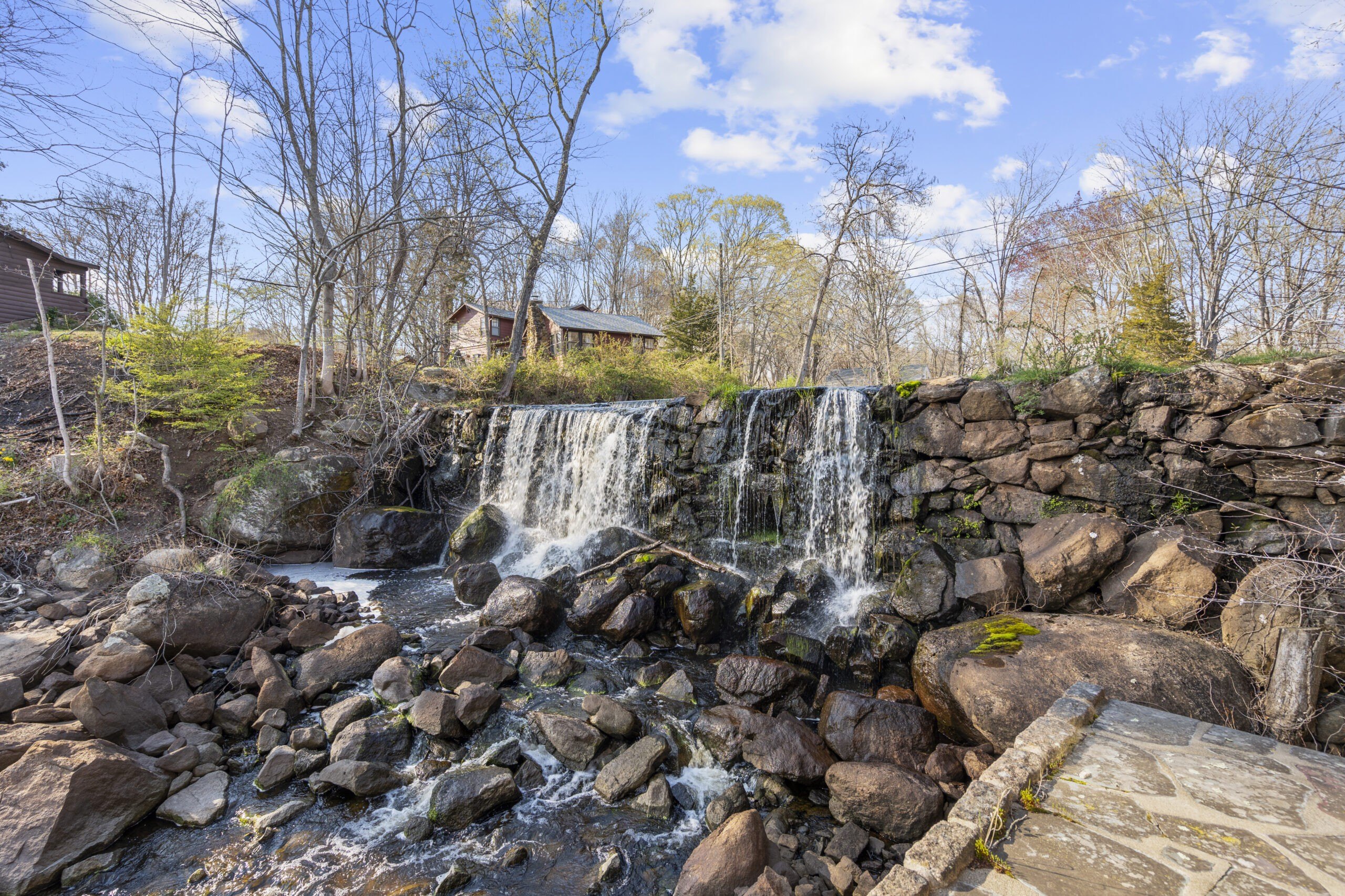 Scenic waterfall found on former sawmill site in Branford, CT, for sale for $1,750,000
