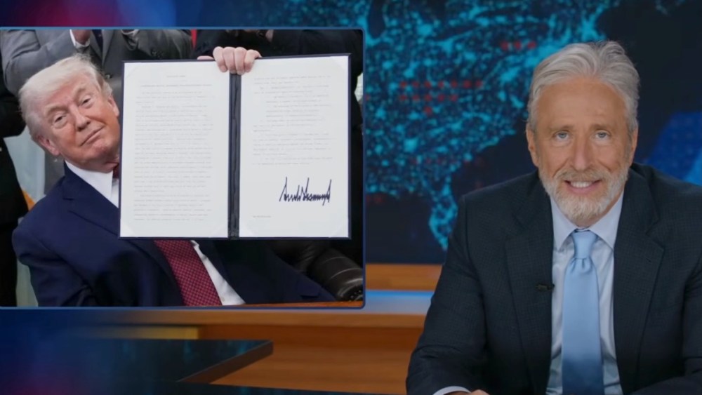 Jon Stewart jokes that Trump used psychedelics when signing the bill