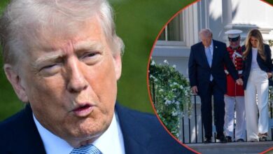 Trump clings to Melania as he descends the steps of the White House