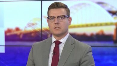 Iowa anchor Dustin Nolan shouts "Sanitized News" as he stops broadcasting